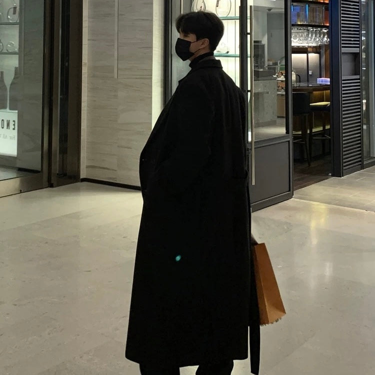 Double-breasted black coat